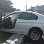 ДТП в Одессе: BMW снес забор и вылетел на газон (фото, видео)