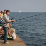 Рыбаки и пляжники: прогулка по одесской набережной (фоторепортаж)